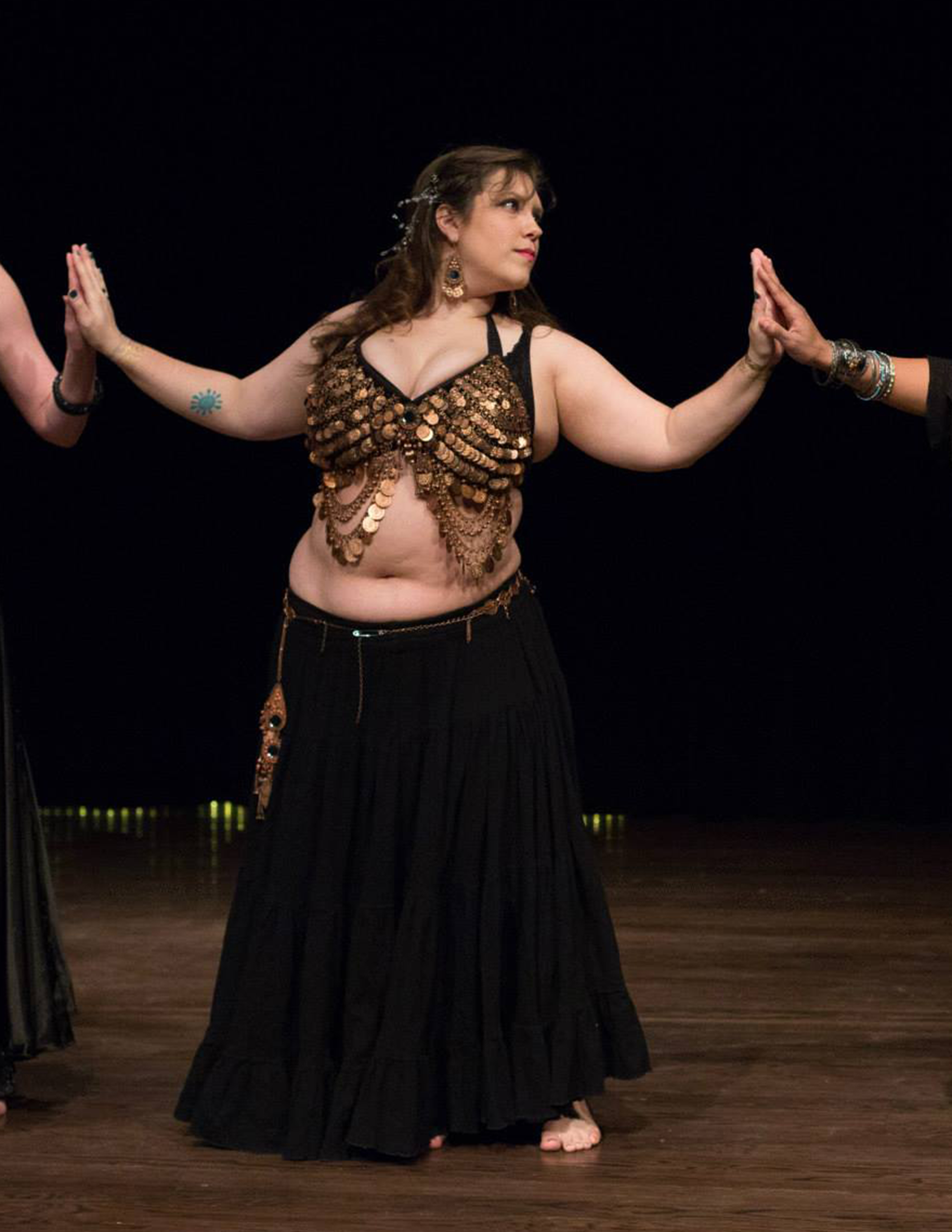 Michelle dancing Bloomington Belly Dances - 2015 in "All Along the Watchtower." 